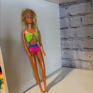 1966 Sun lovin’ Malibu Barbie vintage with peek-a-boo tan